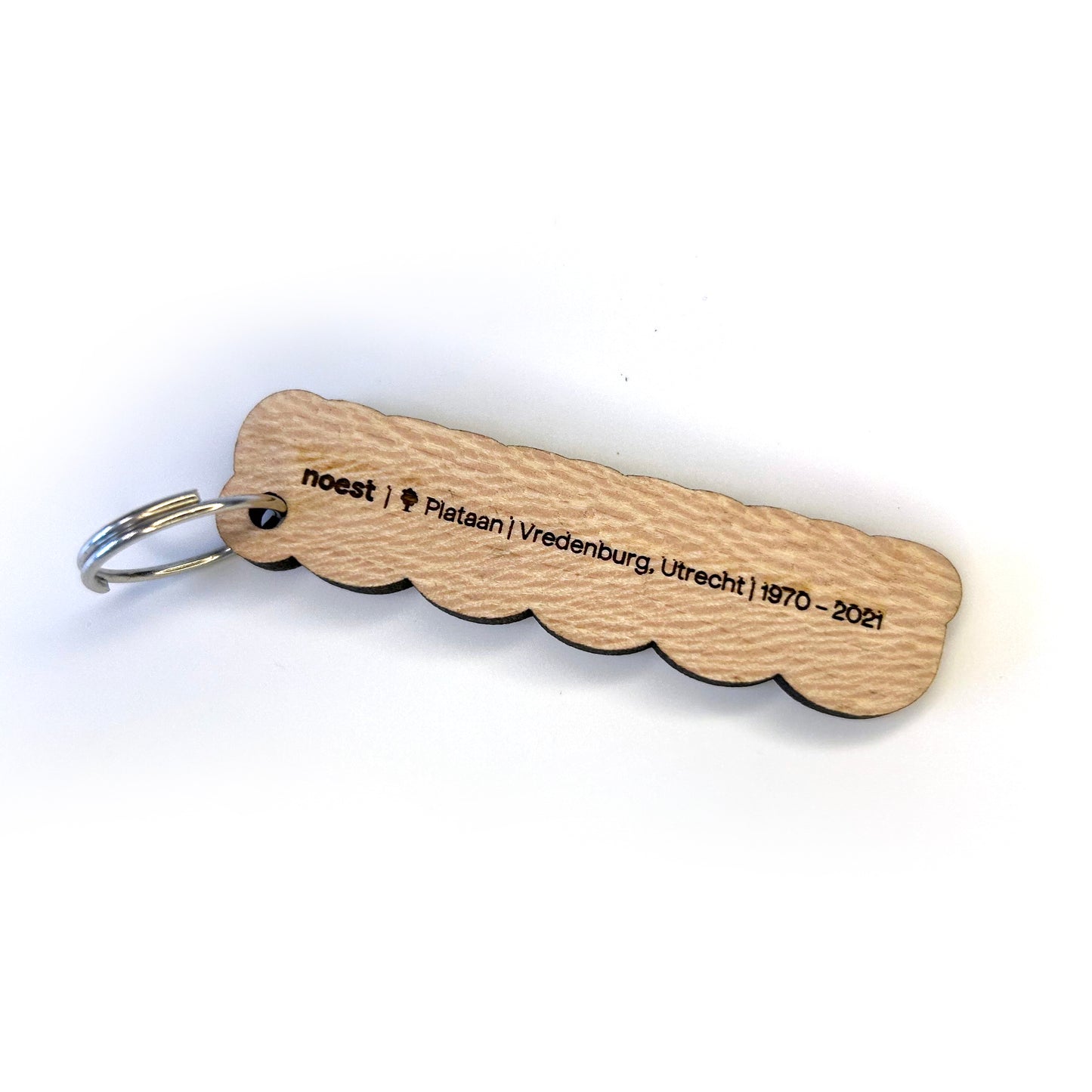 Houten sleutelhanger “UUUUU!” (Utrecht U-symbool), lokaal stadshout, speels design.