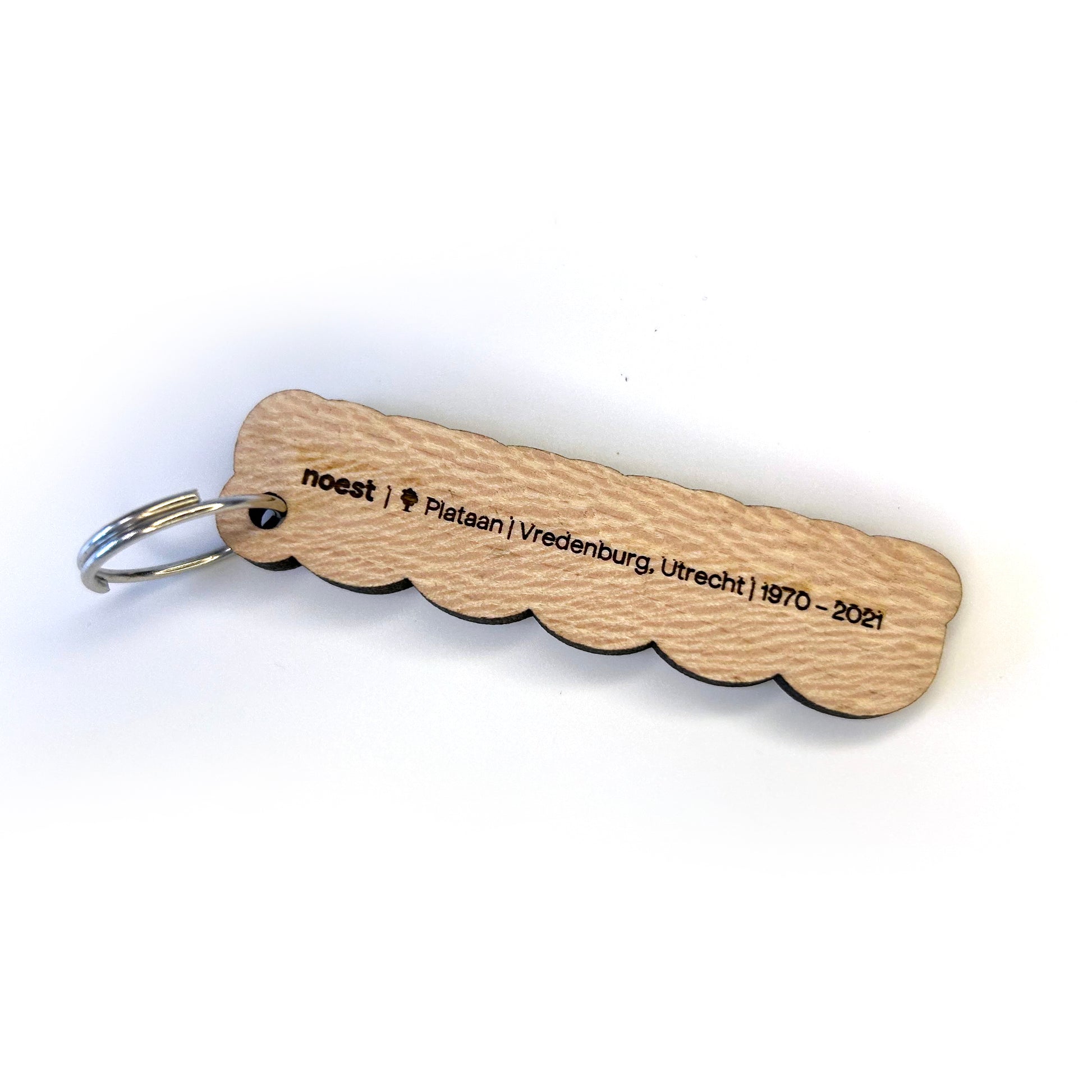 Houten sleutelhanger “UUUUU!” (Utrecht U-symbool), lokaal stadshout, speels design.