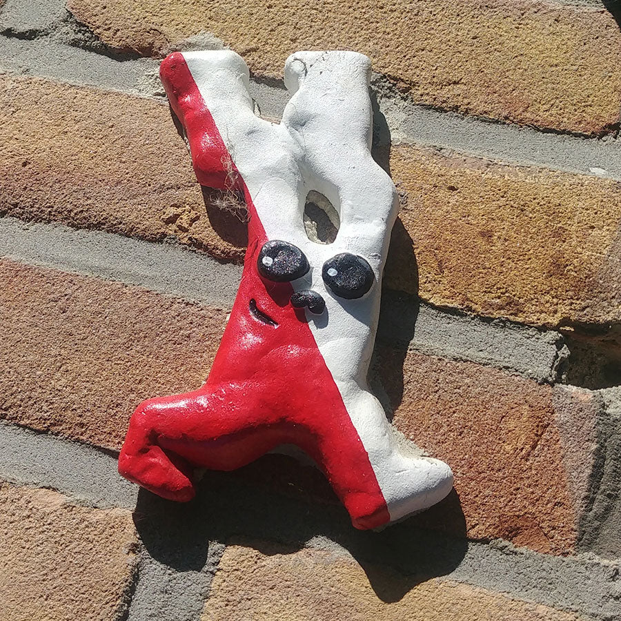 Houten sleutelhanger “Bunbun” (nijntjes Utrechtse konijnenvriendje), gemaakt van Utrechts hout.